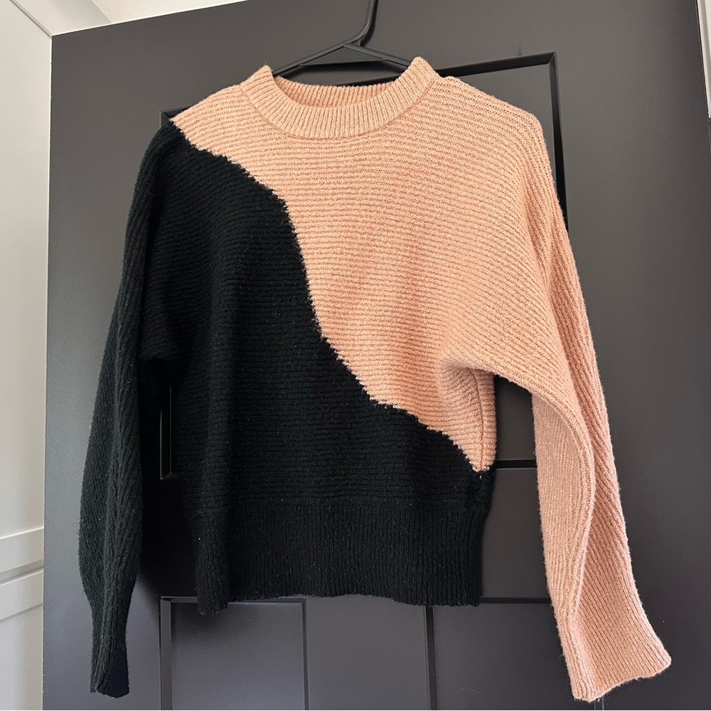 Tan and black cropped sweater.